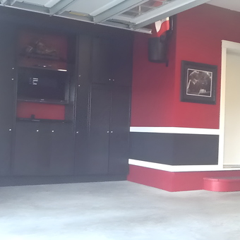 Modern garage with black cabinets and red walls - John from Vernon, Bc
