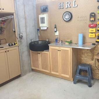 Organized Garage Workspace with Tools and Cabinets - Hizzoner from Flowery Branch, Ga