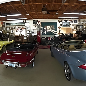 Classic car garage with vintage signs and wall art - Classic PopPop from Jacksonville, FL