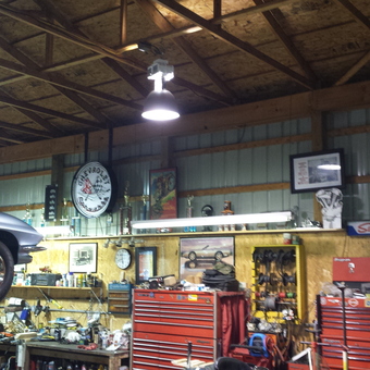 Organized garage with tool chests, workbench, and motorcycle - Joe from Huntingtown, Maryland
