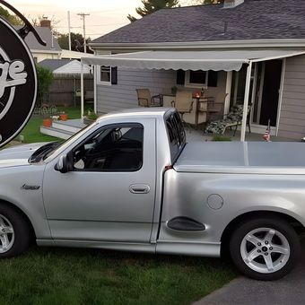 Silver Pickup Truck and Custom Garage Sign - Monte's Garage from Middletown, RI