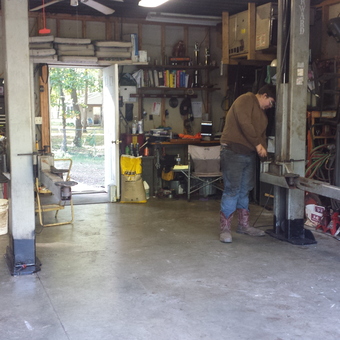 Organized garage with car lift and tools - Keith Bogaert from Osceola, In