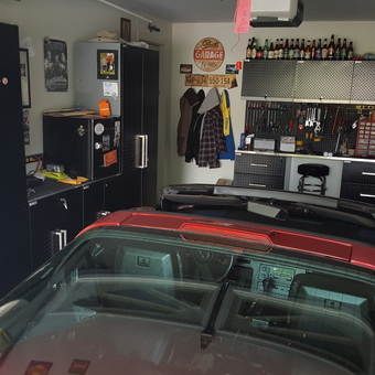 Organized garage with metal cabinets and Corvette - Steve from Pompton Plains, NJ