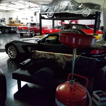 Classic cars, car lift, and oil drain in garage - Ronald Hall from New Smyrna beach, Fl