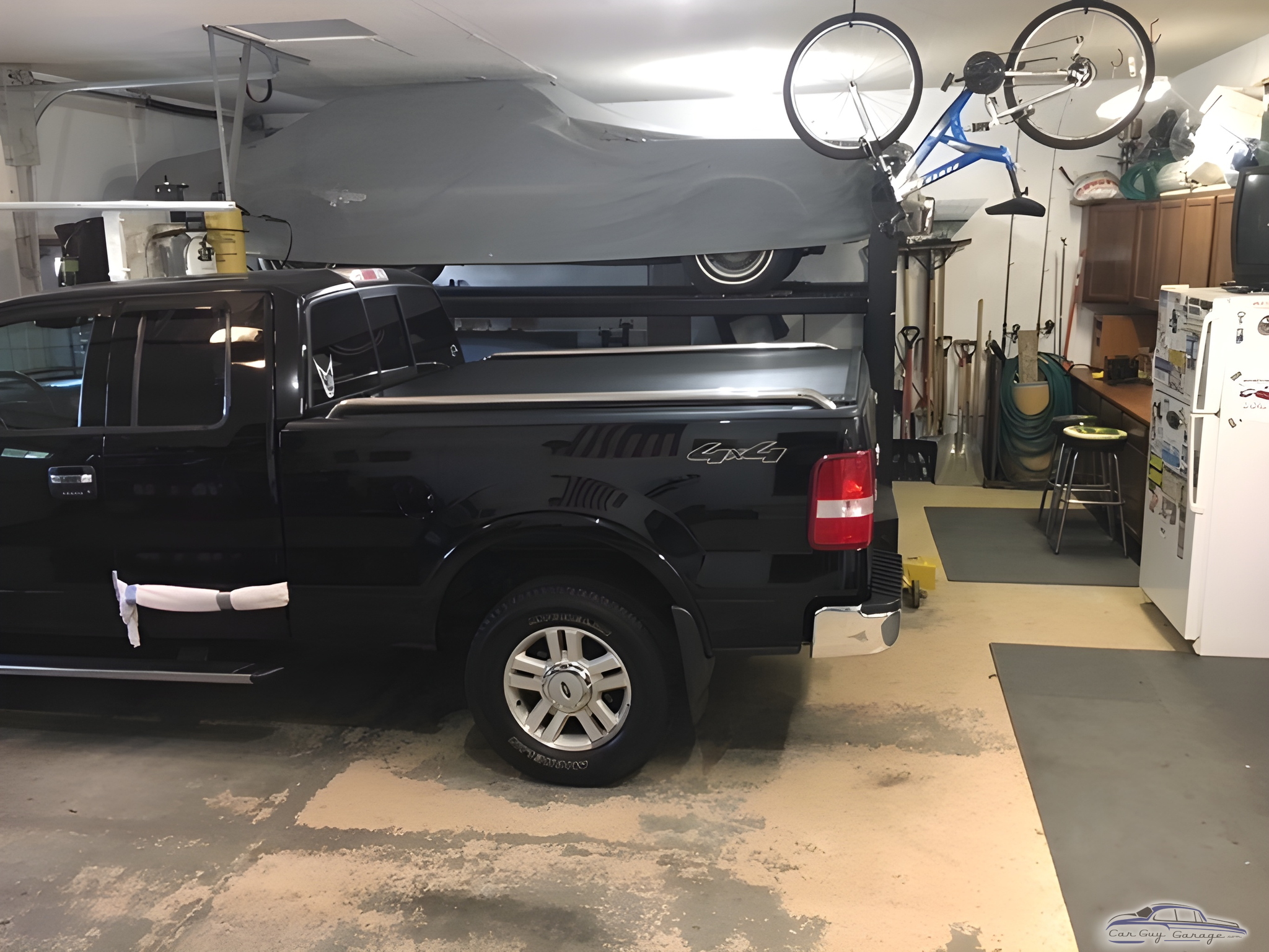 Organized Garage with Truck Lift, Bike Rack, and Storage - Eric from Elko New Market, MN
