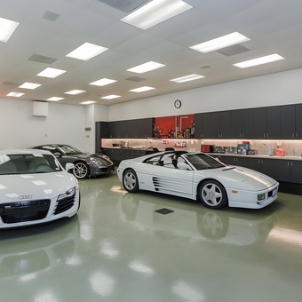 Luxury Car Garage With Cabinets and Neon Sign - Lew from Maryland Heights, MO