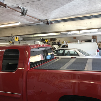 Garage with Red Truck, Storage Cabinets, and Tools - J37 from Huntington, WV