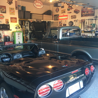 Classic Car Garage with Vintage Signs and Tools - Parfett