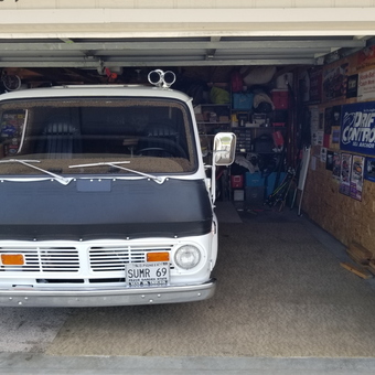 Classic van in organized garage with wall decor - SUMR 69 from WEST FARGO, North Dakota