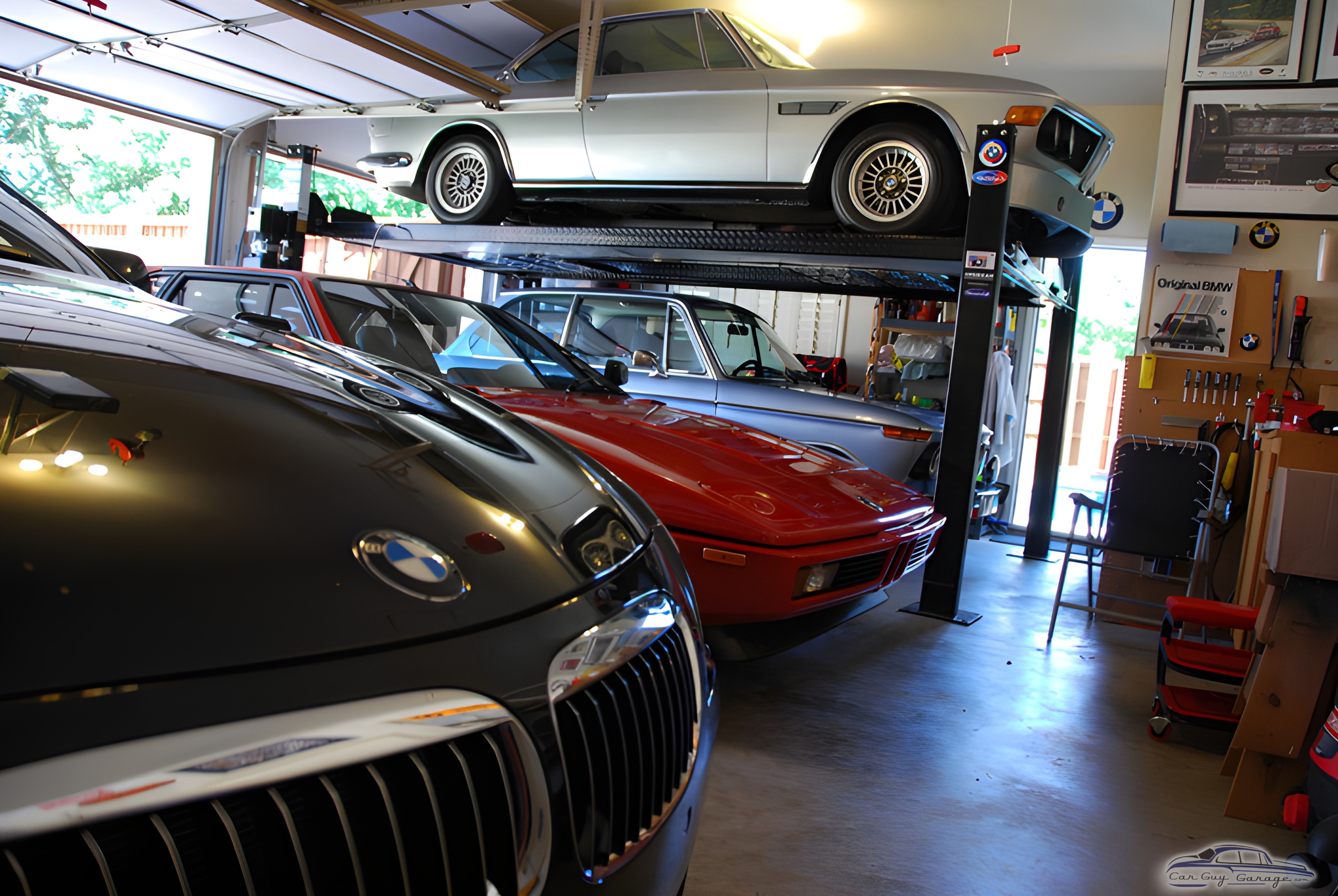 Garage with Car Lift, BMWs, Tools, and Posters - Mike from Plano, TX