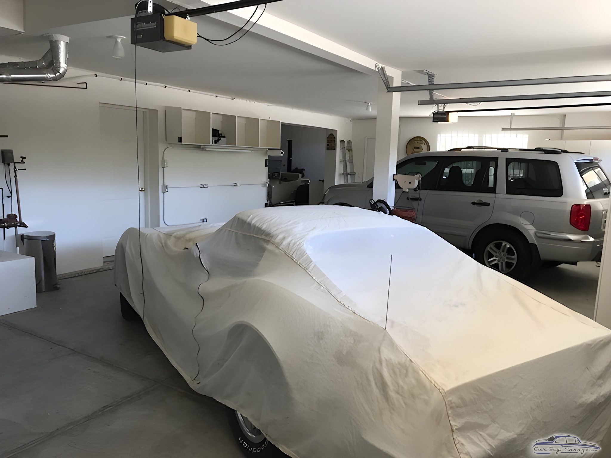 Organized Garage with Covered Classic Car and Shelving - Anthony Natoli from Agua Dulce, California