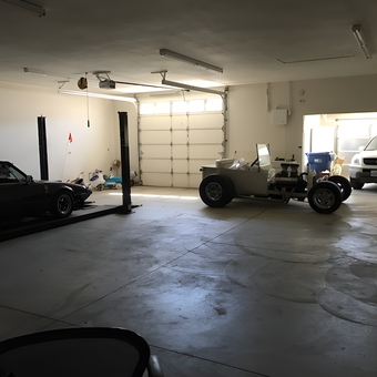 Spacious garage with car lift and classic vehicles - Anthony Natoli from Agua Dulce, California