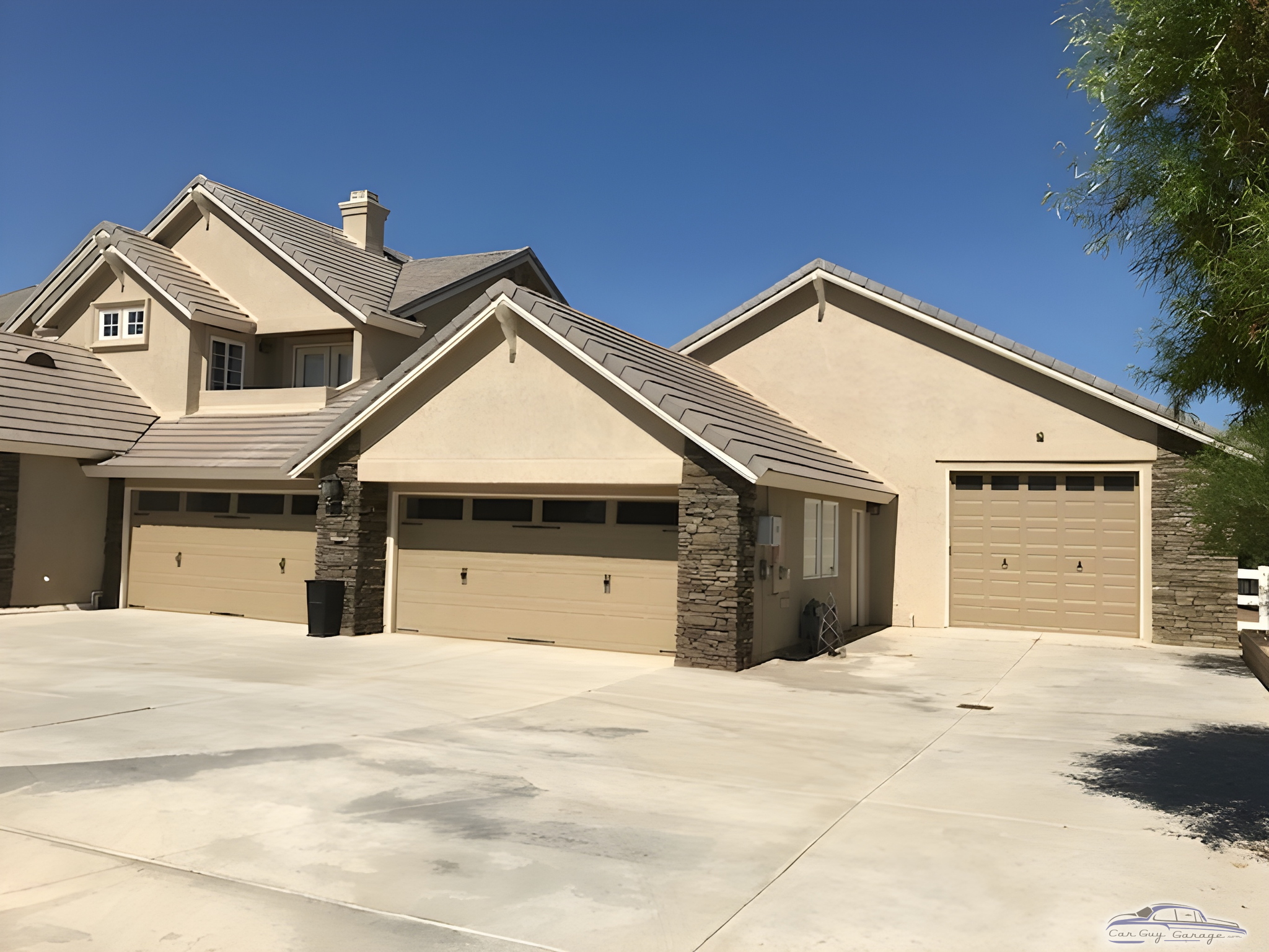 Spacious Three Door Garage with Stone Accents - Anthony Natoli from Agua Dulce, California