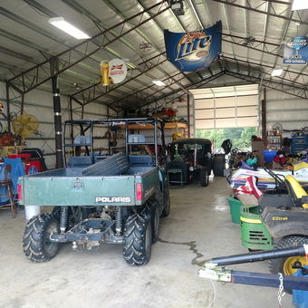 Spacious Garage with ATVs, Tools, and Decor - Pup from Rayville, Missouri