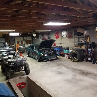 Organized garage with classic truck, tools, and signs - Matt mccartan from COLORADO SPGS, Colorado