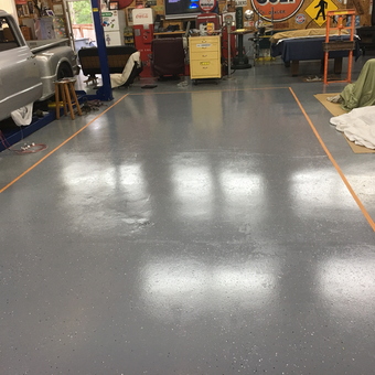 Epoxy Garage Floor With Car Lift and Decor - Zappa from Rome, Georgia