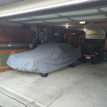 Organized garage with cabinets, car cover, and tools - James from Country Club Hills, Illinois