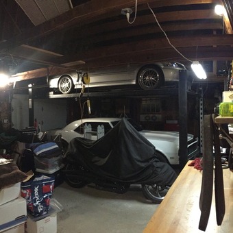 Garage with Car Lift, Workbench, and Storage - CarDr from Cumberland, RI