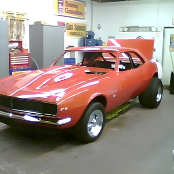 Red Classic Muscle Car in Garage with Storage Cabinets - Kenny's Garage from Milton, Del