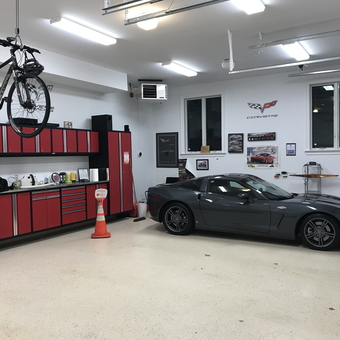 Modern garage with red cabinets and Corvette - Robert from Kinnelon, NJ