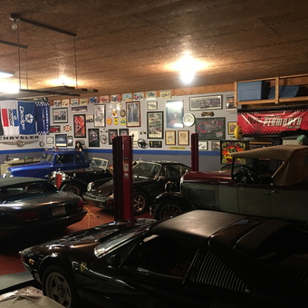 Classic Car Garage With Wall Art and Auto Lifts - Michigan Mille from Highland, MI