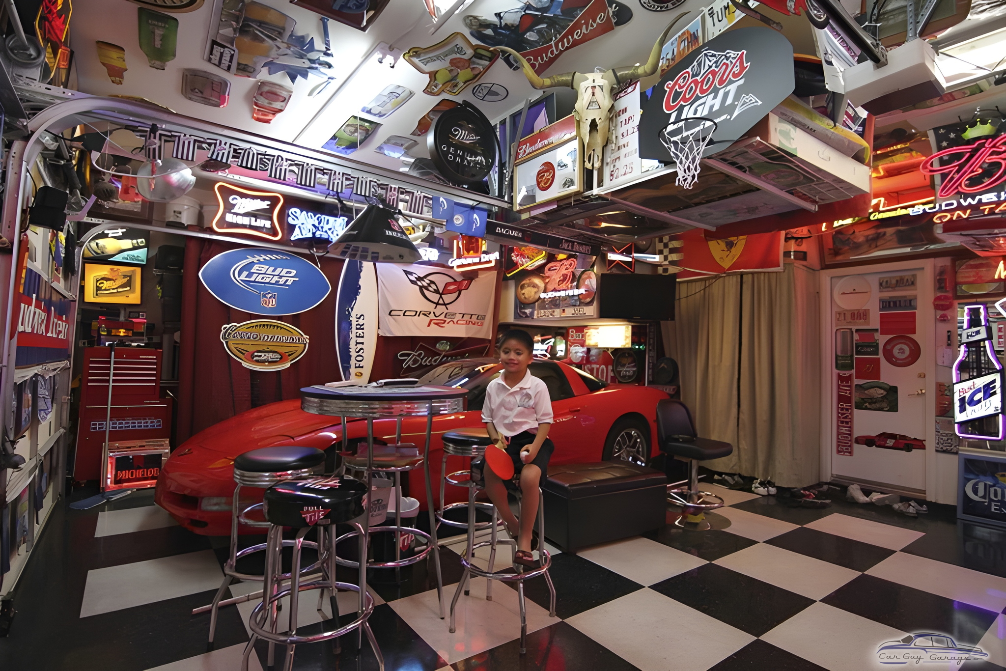 Ultimate car-themed garage with neon signs and bar stools - Kalabaw from Las Vegas, NV