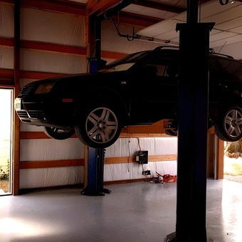 Spacious garage with car lift and storage cabinets - joseph from Kirkland, Wa