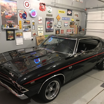 Classic Car Garage with Wall Signs and Neon Clocks - Beach Pal from McDonald, Pa