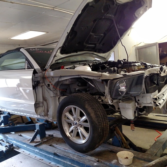 Convertible Car Restoration on Lift with Tools - Dawn from Richland Center, WI