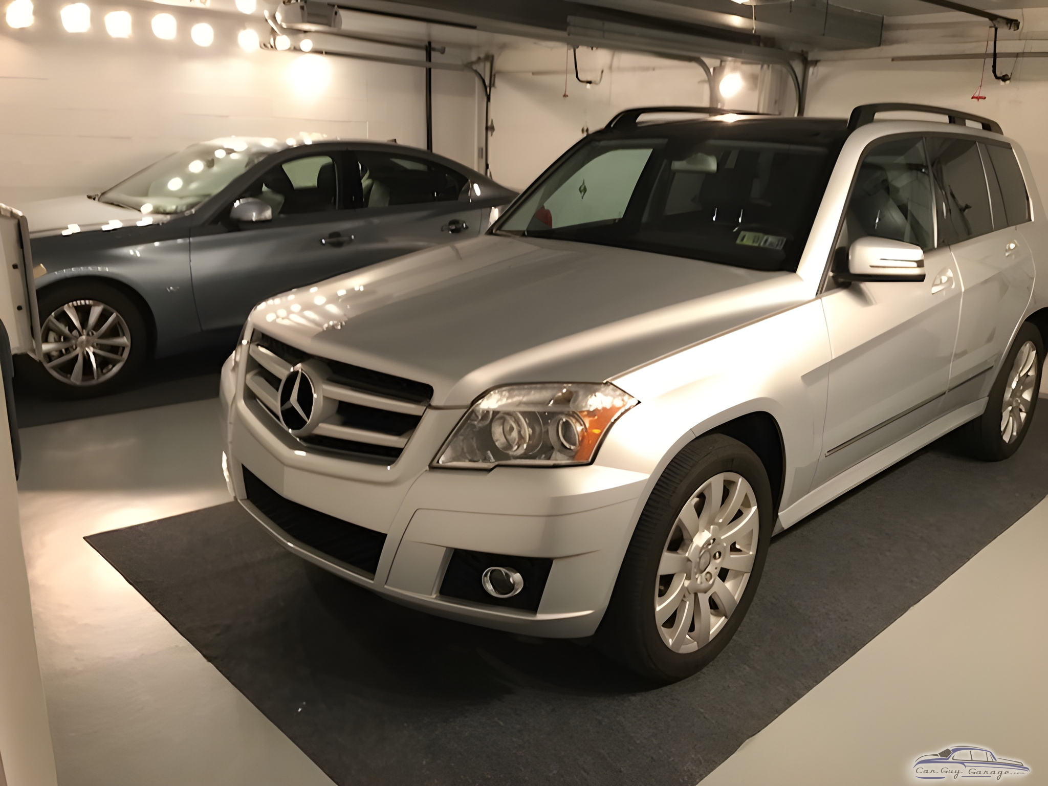 Clean garage with luxury cars and bright lighting - Bob from Clairton, PA