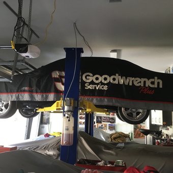 Garage with Car Lift, Goodwrench Car Cover, and Wall Decor - Chevyman from BLUFFTON, SC