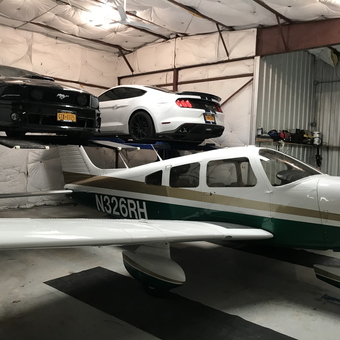 Garage Car Lift with Two Mustangs and Airplane - Rodney from East Hampton, NY
