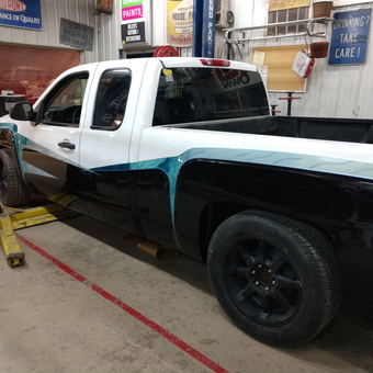 Pickup Truck on Two-Post Lift in Custom Garage - Killer's Shop from Benson, MN