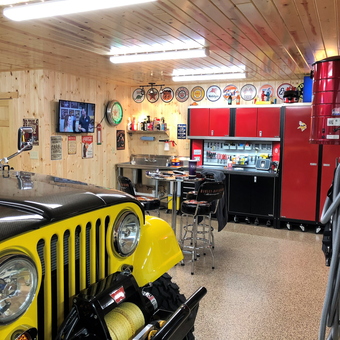 Organized garage with red cabinets and Jeep - Steve from Shoreview, MN