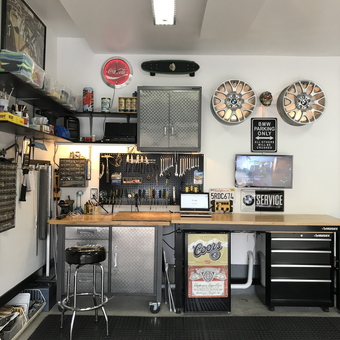 Organized garage workspace with tool storage and decor - Dave from Guelph, Ontario
