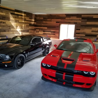 Modern garage with muscle cars and wood accent walls - Travis Moldenhauer from Appleton, Wisconsin