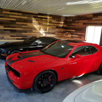 Modern garage with muscle cars and wood accent wall - Travis Moldenhauer from Appleton, Wisconsin