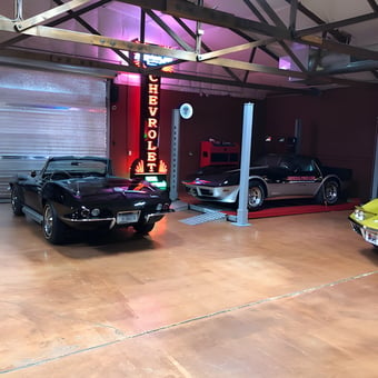 Classic Corvette Garage with Car Lift and Neon Sign - Bob