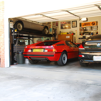 Organized Three-Car Garage with Car Lift and Wall Storage - Mike from Plano, TX