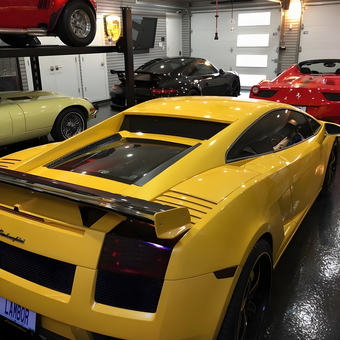 Luxury Sports Cars and Car Lift in Modern Garage - Steve from St Louis, MO