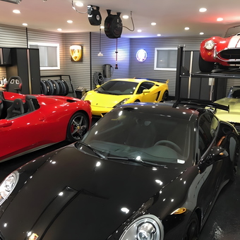 Luxury Garage with Car Lift, Cabinets, and Sports Cars - Steve from St. Louis from St Louis, MO