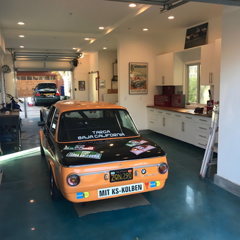 Classic car garage with tool cabinets and posters - Steve from Encinitas, CA