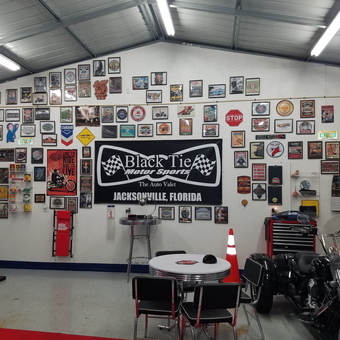 Garage Decor with Vintage Signs, Motorcycle, and Tool Chest - LES HOUPT from JACKSONVILLE, FL