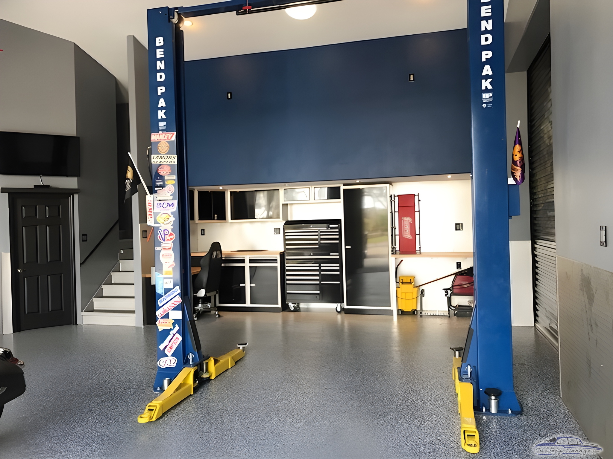 Organized garage with BendPak car lift and tool storage - P&J Motorsports from Parrish, Florida