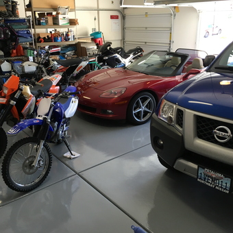 Organized Garage with Motorcycles, Sports Car, and Shelving - Frank Brabec MBA CMPE from Indio, CA