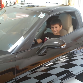 Sports Car in Garage with Checkered Floor - Future gear heads