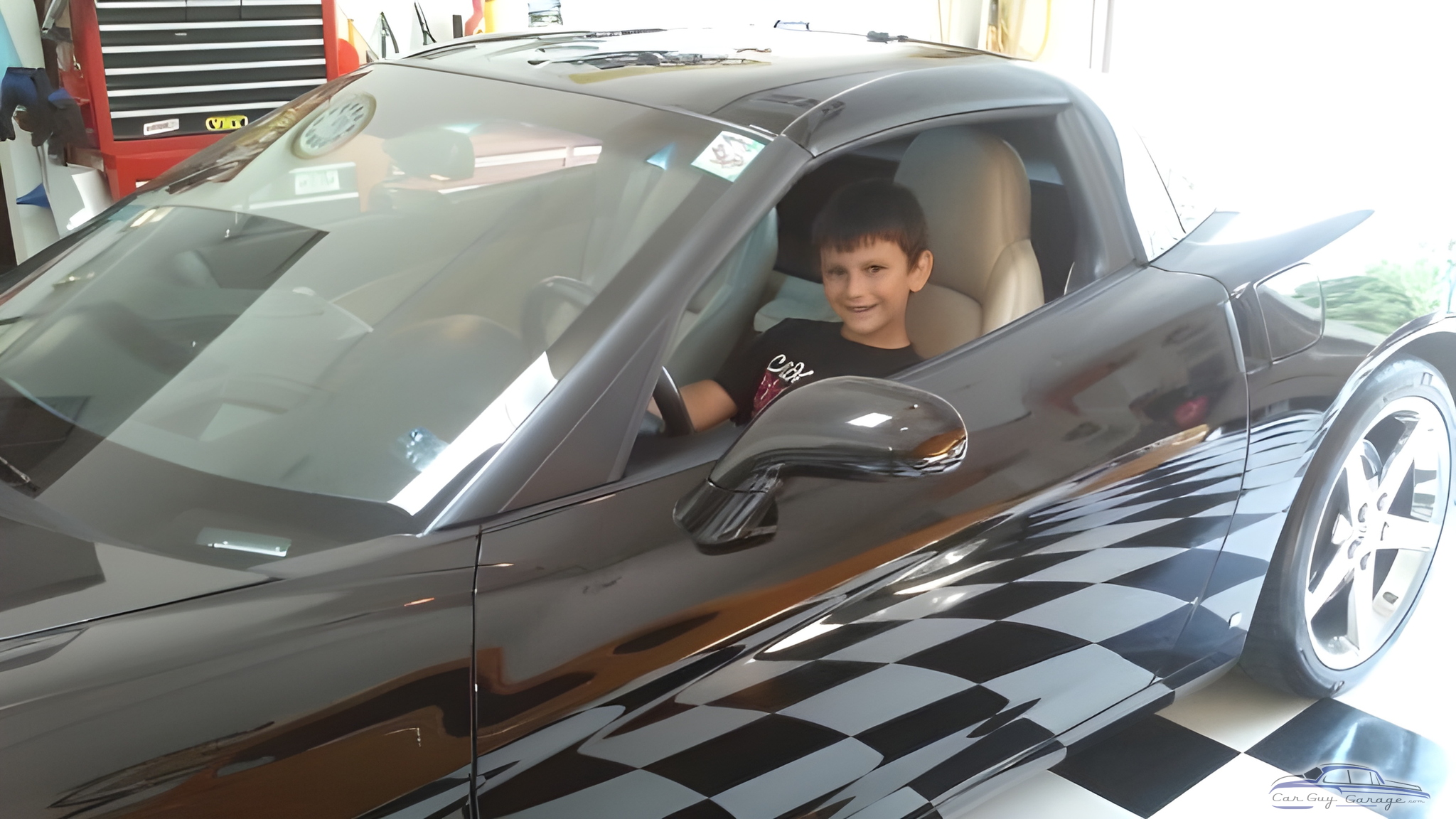 Sports Car in Garage with Checkered Floor - Future gear heads
