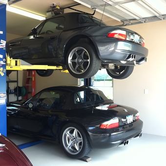 Two BMWs on Four Post Lift in Organized Garage - Randy from Parrish, FL