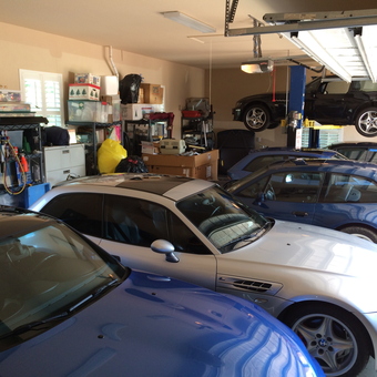 Organized garage with car lift, shelving, and storage - Randy from Parrish, Florida