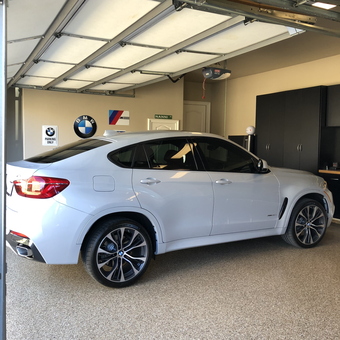 BMW Garage with Wall Cabinets and Signage - Bill from Lantana, Texas